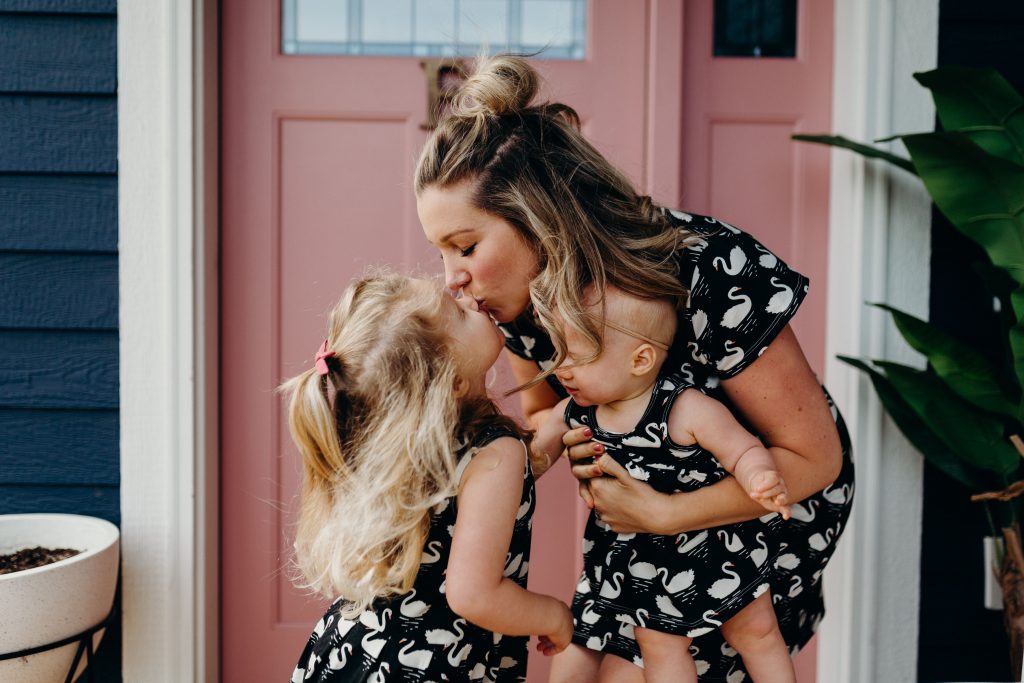 mom and two daughters matching outfits