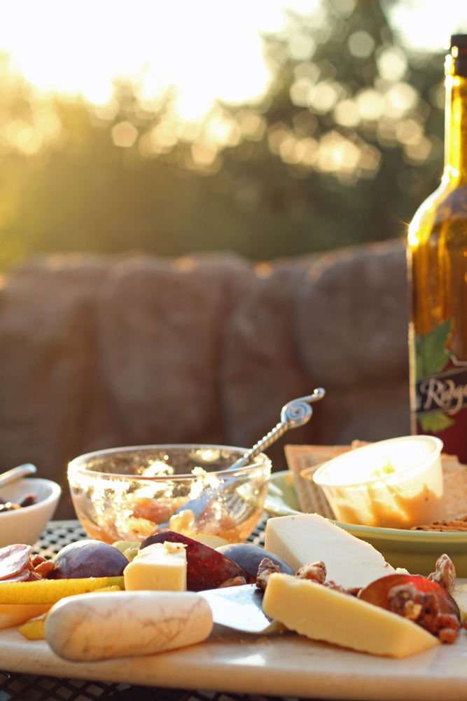 wine and cheese at sunset